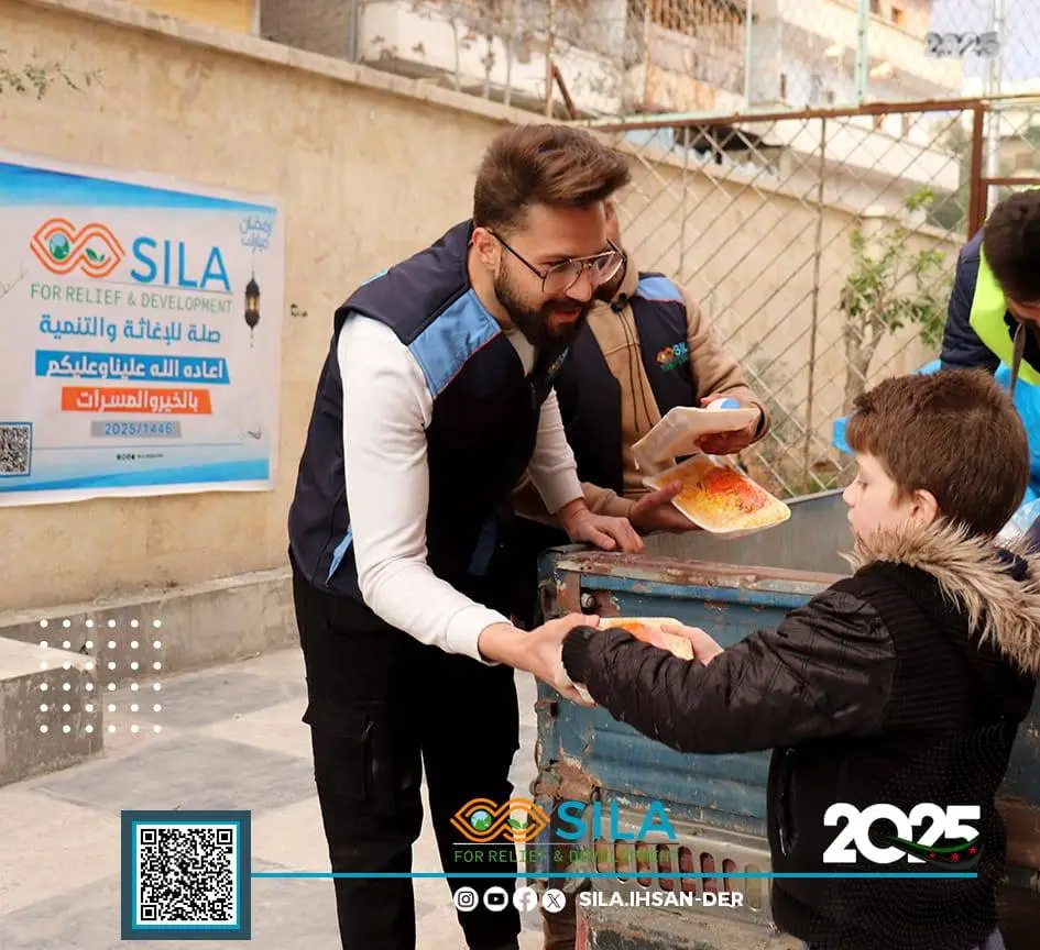 Distributing Iftar meals in Aleppo neighborhoods